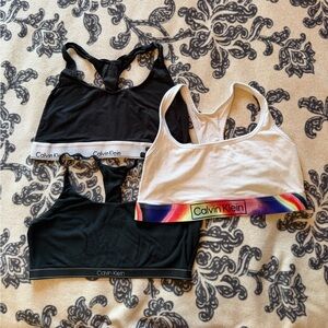 Calvin Klein Black, White, and Rainbow Sports Bras Trio